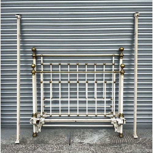 945 - A Victorian style brass and painted iron double bed, 138cm wide.