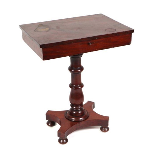 955 - A Victorian mahogany work table, the rectangular hinged top enclosing a fitted interior, on turned c... 