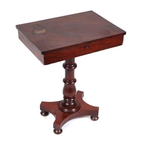 955 - A Victorian mahogany work table, the rectangular hinged top enclosing a fitted interior, on turned c... 