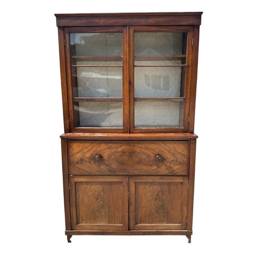 958 - A Victorian mahogany secretaire bookcase, the upper bookcase section with twin glazed drawers enclos... 