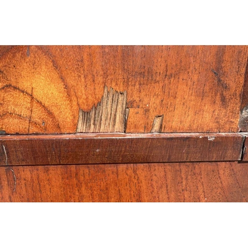 958 - A Victorian mahogany secretaire bookcase, the upper bookcase section with twin glazed drawers enclos... 