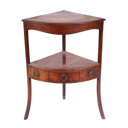 964 - A George III mahogany corner washstand with solid top above an under-tier and three drawers, on a sp... 