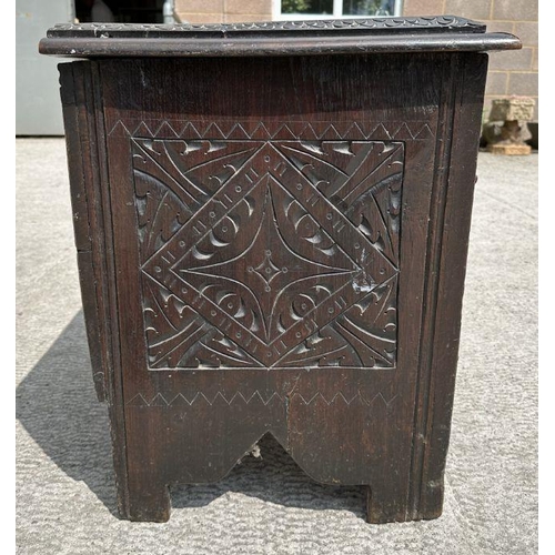 966 - A Victorian Edwards & Roberts 17th century style oak coffer with candle box and carved decoratio... 