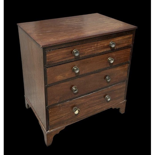 968 - A 19th century mahogany chest of four graduated long drawers on bracket feet, 70cm wide.