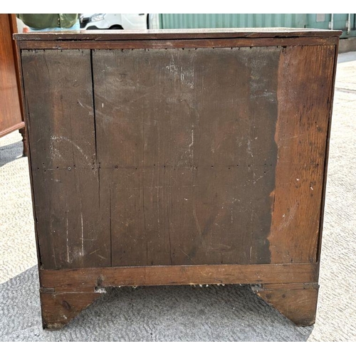 968 - A 19th century mahogany chest of four graduated long drawers on bracket feet, 70cm wide.