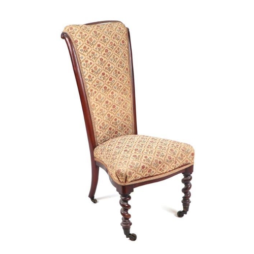 973 - A Victorian upholstered prie-dieu type chair with walnut barley twist front legs.