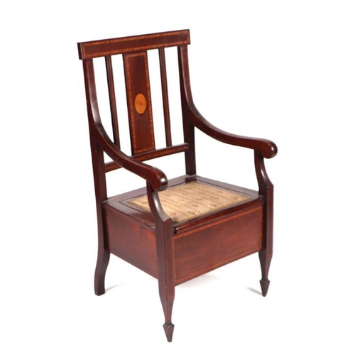 974 - A late 19th century mahogany commode chair, having a back splat with oak leaf inlaid decoration, scr... 