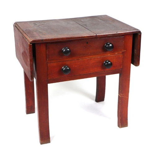 975 - A 19th century stained pine dairy table, the rectangular top with drop flaps above two drawers with ... 