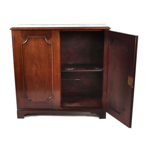 977 - A pair of Victorian mahogany bookcases, each with a pair of panelled doors enclosing shelves, on bra... 