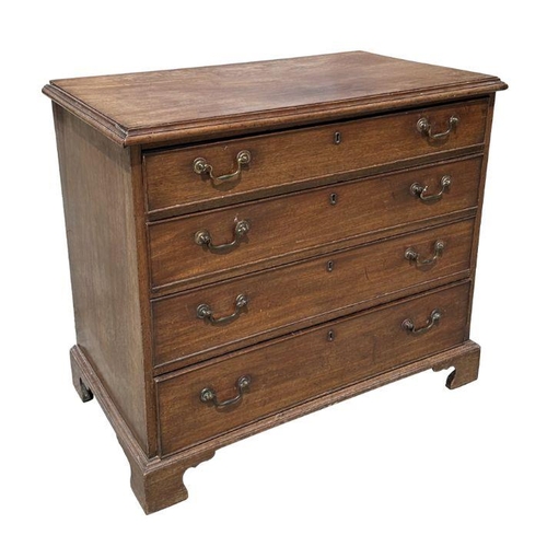 984 - A George III mahogany chest of four graduated long drawers, on bracket feet, 94cm wide.