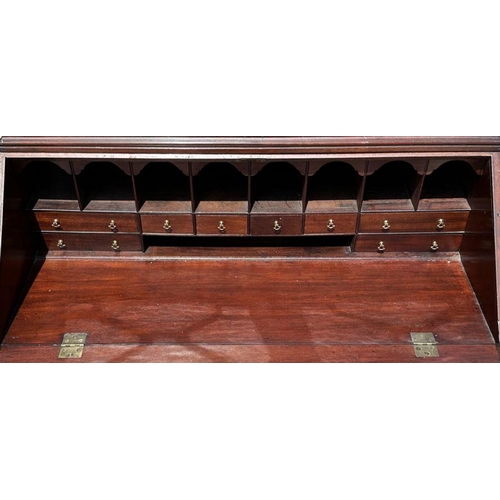 987 - A late 19th century mahogany bureau bookcase, the upper section with twin astragal glazed doors encl... 