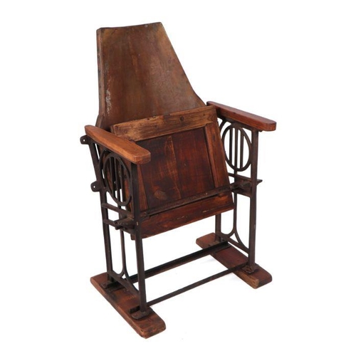 995 - An Art Deco cast iron folding theatre chair.