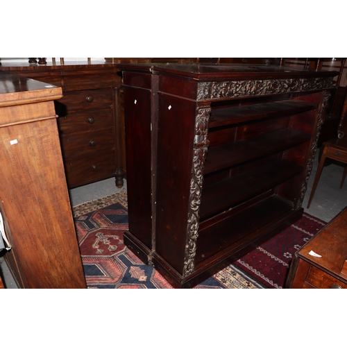 1007 - A pair of Victorian mahogany open bookcases, the frieze and sides decorated with applied carved oak ... 