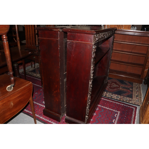 1007 - A pair of Victorian mahogany open bookcases, the frieze and sides decorated with applied carved oak ... 