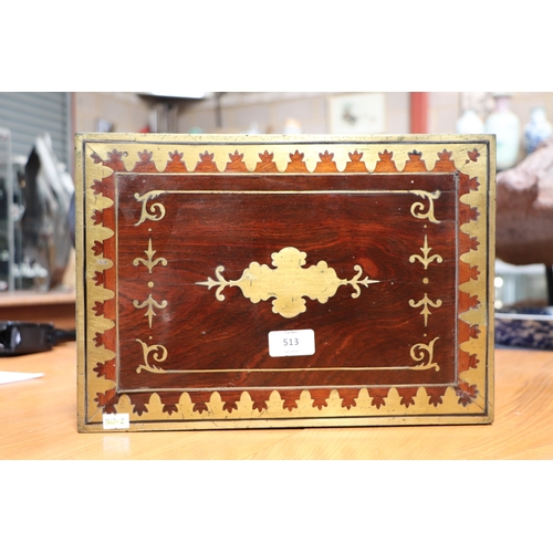 513 - A Regency mahogany writing slope with brass inlay decoration, 36cms wide.