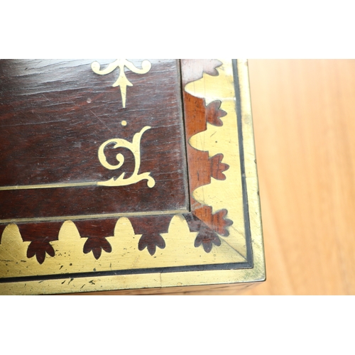 513 - A Regency mahogany writing slope with brass inlay decoration, 36cms wide.