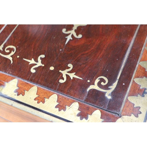 513 - A Regency mahogany writing slope with brass inlay decoration, 36cms wide.