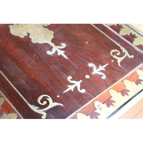 513 - A Regency mahogany writing slope with brass inlay decoration, 36cms wide.