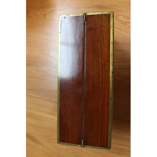 513 - A Regency mahogany writing slope with brass inlay decoration, 36cms wide.