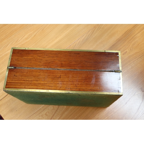 513 - A Regency mahogany writing slope with brass inlay decoration, 36cms wide.