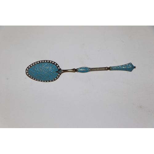 688 - A set of six continental silver gilt and enamel teaspoons, 75g (6).