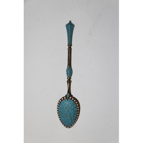 688 - A set of six continental silver gilt and enamel teaspoons, 75g (6).