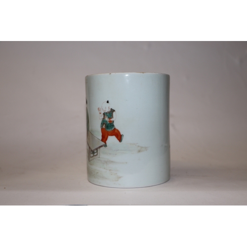 896 - A Chinese famille rose Bitong brush pot decorated with boys playing and a robed female seated on a b... 