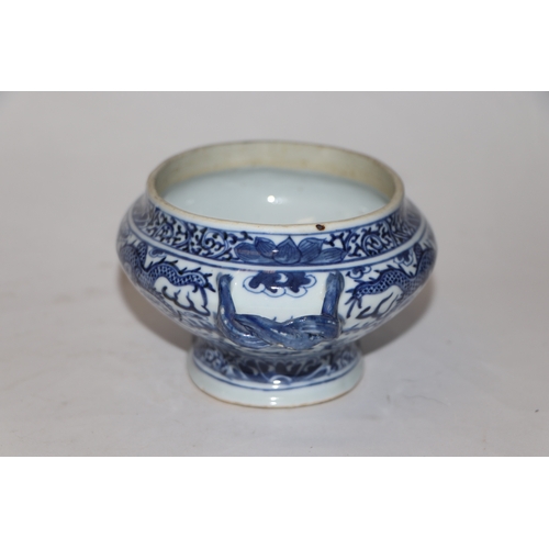 796 - A Chinese blue & white baluster vase decorated in relief with a landscape, four character mark to th... 