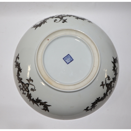 889 - A Chinese Republic footed bowl decorated with an extensive garden landscape scene, blue seal mark to... 