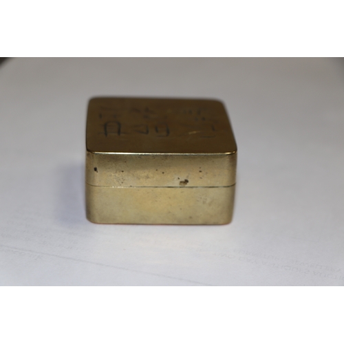 774 - A Chinese brass ink block box. 5cm wide