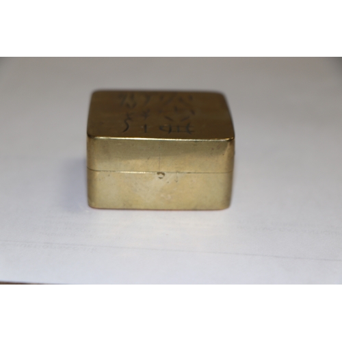 774 - A Chinese brass ink block box. 5cm wide