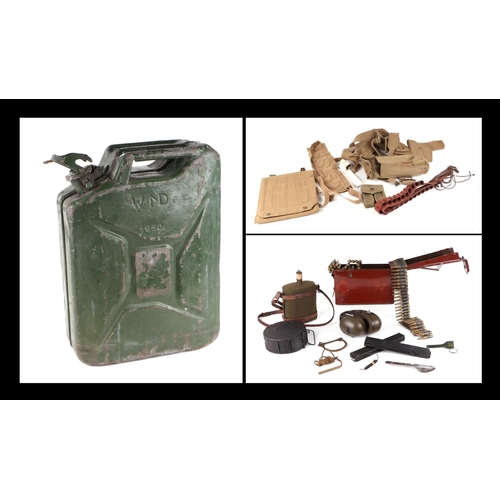 122 - A large quantity of militaria to include webbing, cartridges, magazine cases, water bottle and other... 