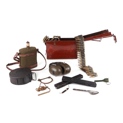 122 - A large quantity of militaria to include webbing, cartridges, magazine cases, water bottle and other... 