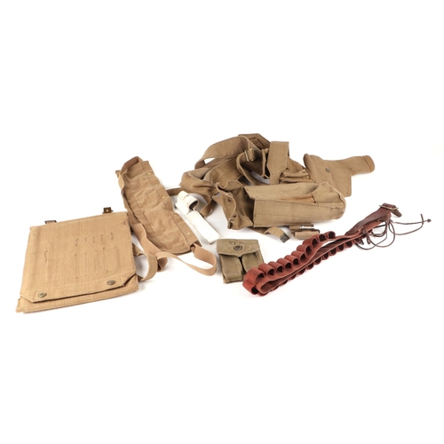 122 - A large quantity of militaria to include webbing, cartridges, magazine cases, water bottle and other... 