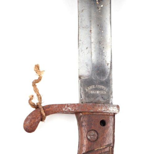 128 - A WWI German Butcher bayonet & scabbard, the blade marked Alex Coppel, Solingen.