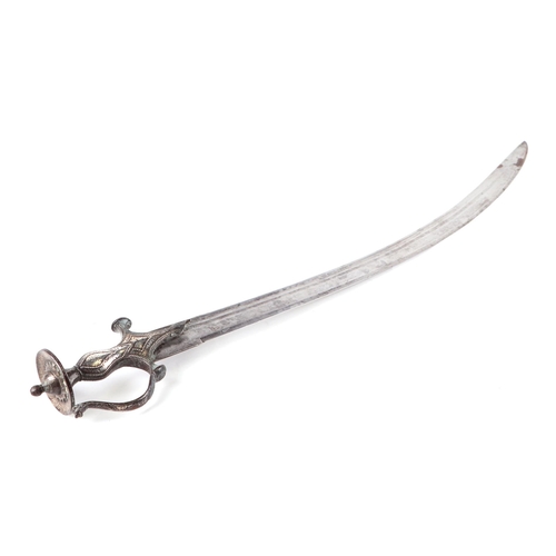 135 - An Indian Tulwar sword with white metal inlaid handle, 87cm long.