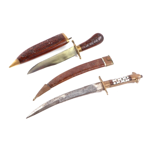 138 - An Indian dagger with mother of pearl inlaid brass handle and steel curved blade with engraved decor... 