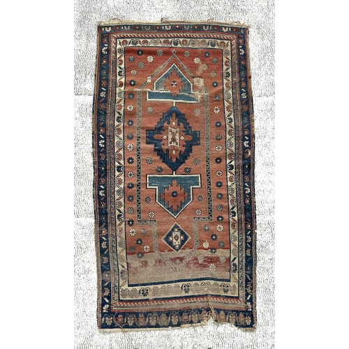 143 - A Turkish prayer rug on a pale blue ground and foliate borders, probably late 19th century, 103 by 1... 