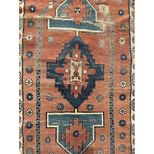 143 - A Turkish prayer rug on a pale blue ground and foliate borders, probably late 19th century, 103 by 1... 