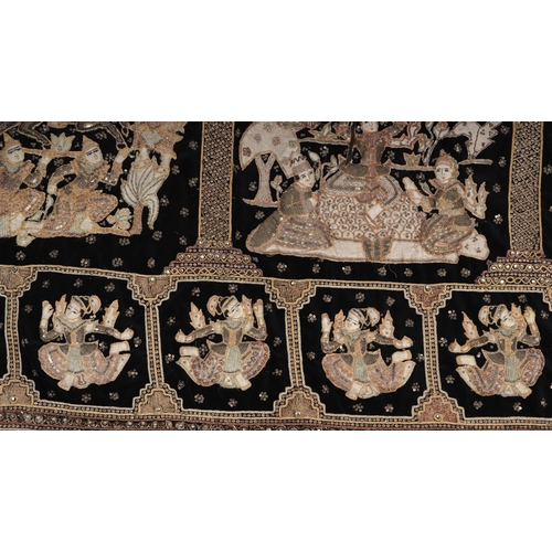 144 - A Burmese Kalaga sequined tapestry depicting figures within panels 173 by 83cm