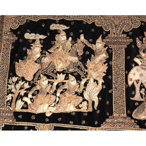 144 - A Burmese Kalaga sequined tapestry depicting figures within panels 173 by 83cm