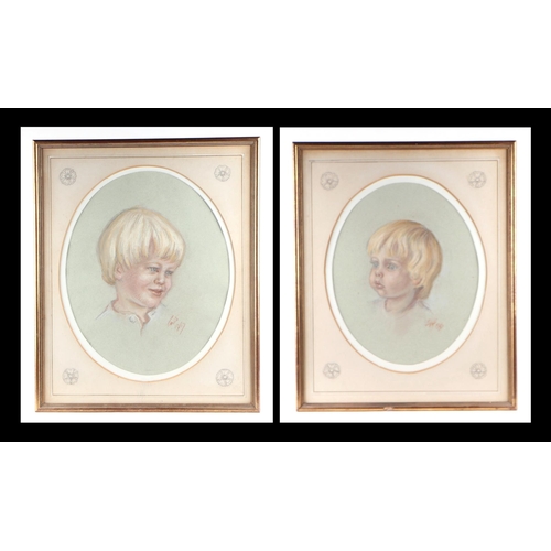 207 - 20th century British School - a pair of head & shoulder portraits depicting young boys, pastel, both... 