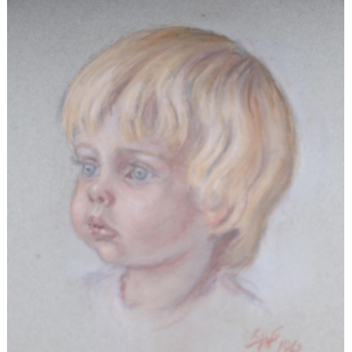 207 - 20th century British School - a pair of head & shoulder portraits depicting young boys, pastel, both... 