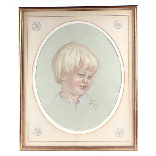 207 - 20th century British School - a pair of head & shoulder portraits depicting young boys, pastel, both... 