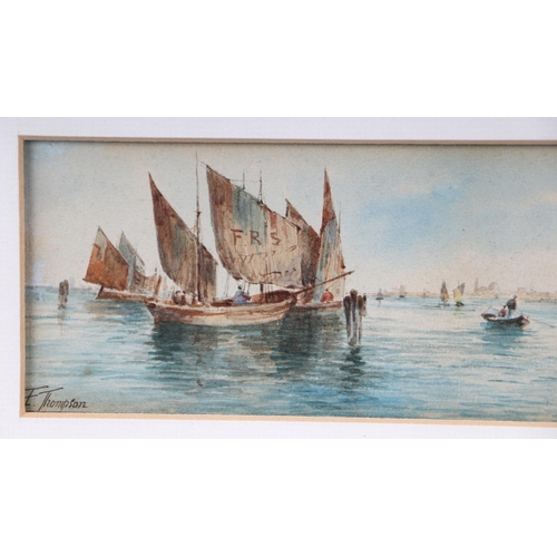 214 - E Thompson - a pair of seascapes with fishing boats in a harbour, both signed lower left, watercolou... 