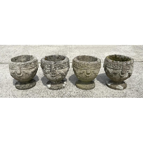 22 - A set of four well weathered reconstituted stone urn form planters, 23cm diameter, (4)