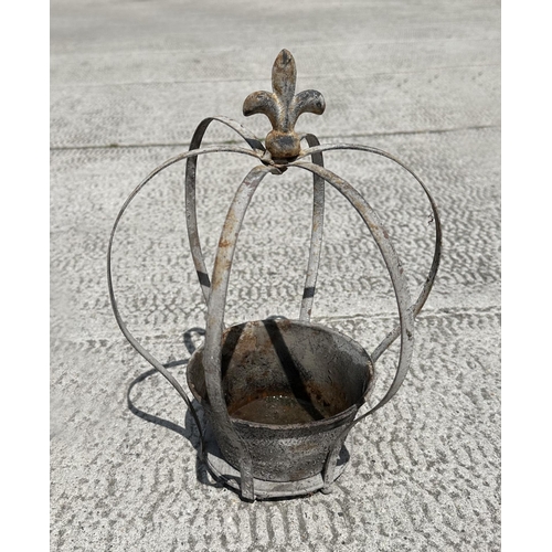 23 - A graduated set of galvanised crown form planters, largest 34cm high, (3)