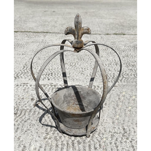 23 - A graduated set of galvanised crown form planters, largest 34cm high, (3)