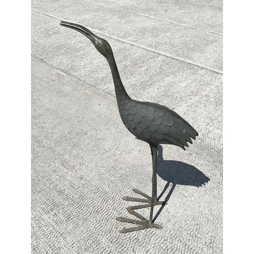 24 - A Japanese style bronze heron / crane, 85cm high,