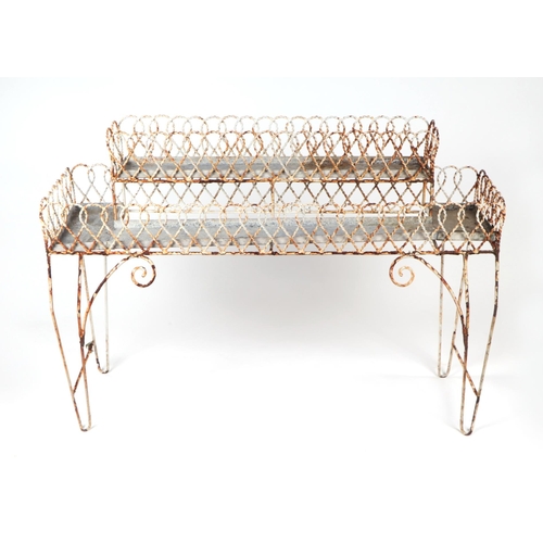 29 - A well weathered wire work two tier garden planter, 108cm wide.